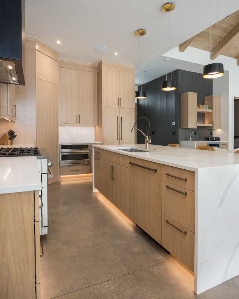 This is a picture of a kitchen featuring White Oak cabinetry from Bridgewood Cabinetry in Dillon, CO.