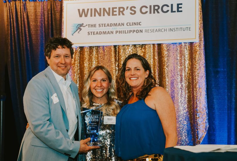 The Creative Cabinetry team accepts the 2024 Medium Business of the Year Award