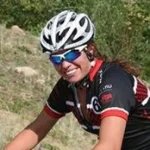 This is a picture of a girl riding a bike