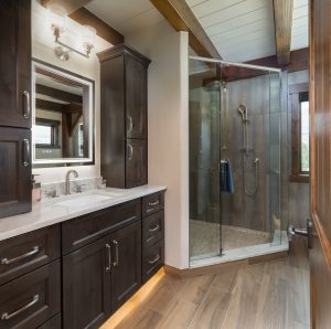 Knotty Alder bathroom cabinetry in Koala stain by Bridgewood Cabinetry